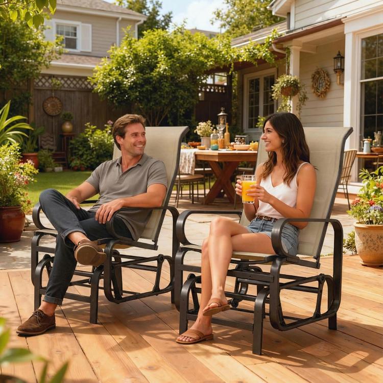 Two khaki mesh glider rocker chairs with dark frames on a patio, occupied