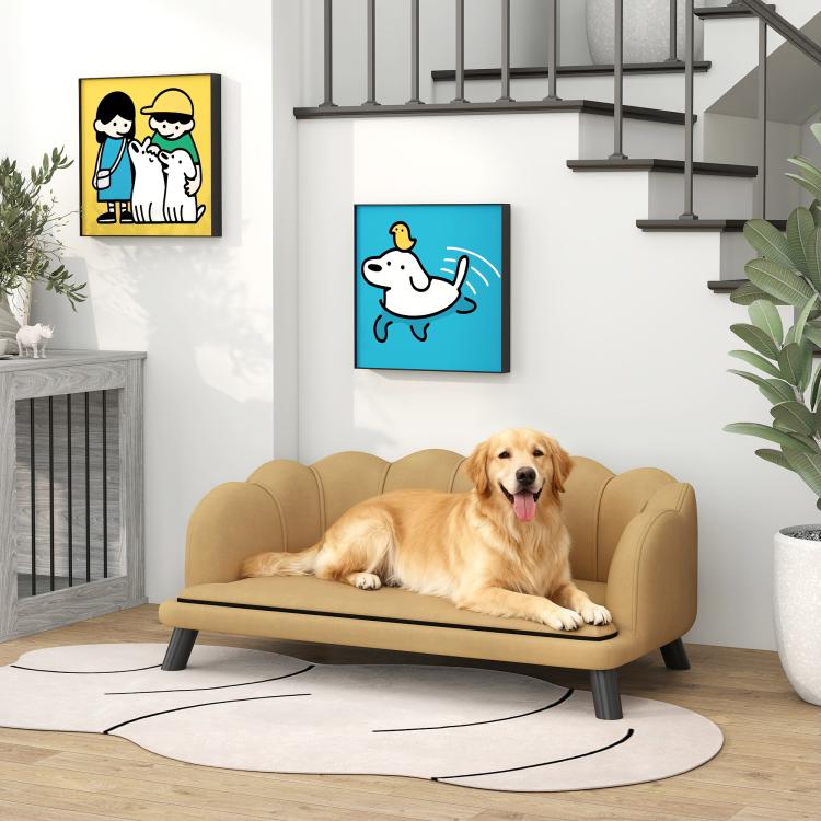 Beige pet sofa with rounded backrest, black legs, dog lying inside
