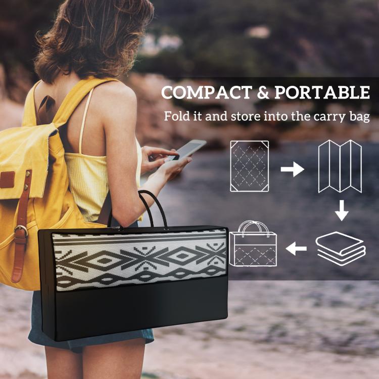 Foldable outdoor rug carpet in zip carry bag with black-and-white geometric pattern