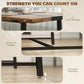 Black steel crossbar under brown tabletop with adjustable foot pads, underside detail