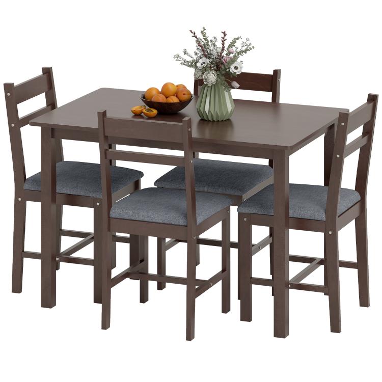 Farmhouse dining table with four upholstered chairs in walnut-brown wood