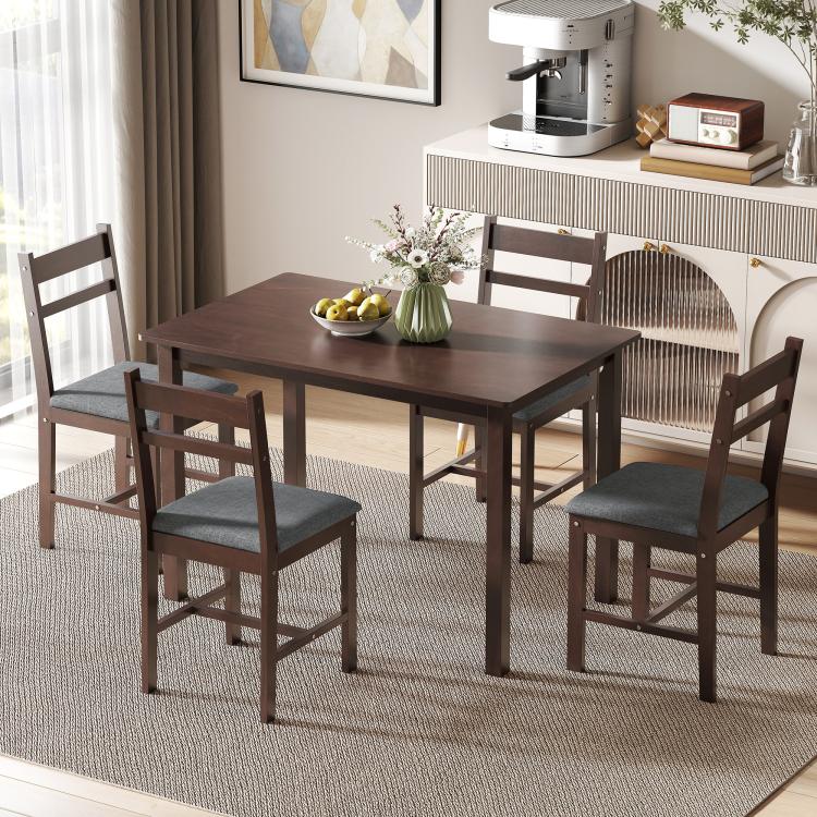 Walnut-brown dining table and four upholstered chairs with gray fabric seats