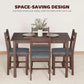 Dining table set with four upholstered armchairs tucked under the table