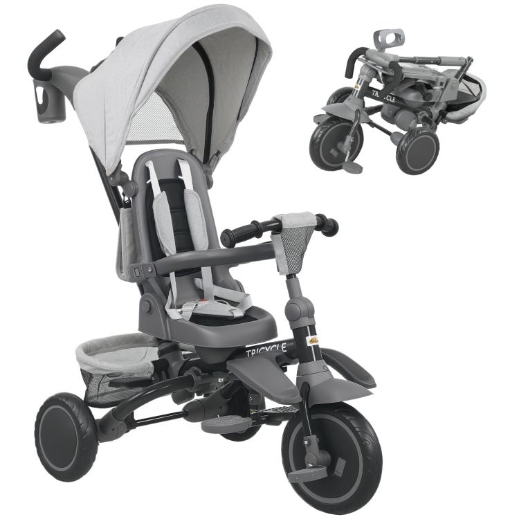 Gray kids tricycle with adjustable push handle, canopy, and reversible seat, angled view