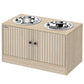 Oak-tone dog feeding station with two stainless steel bowls on top and cabinet doors