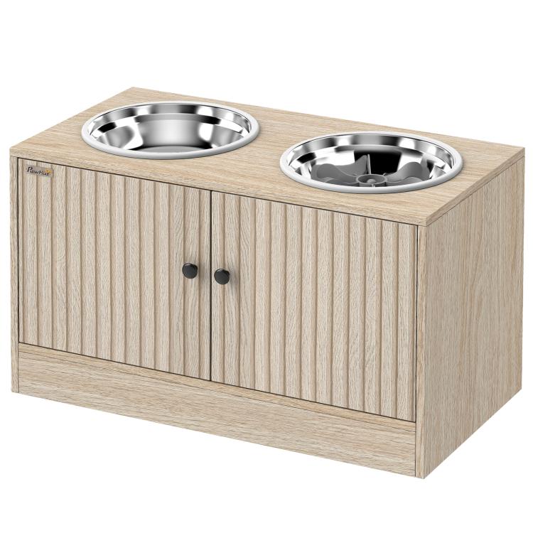 Oak-tone dog feeding station with two stainless steel bowls on top and cabinet doors