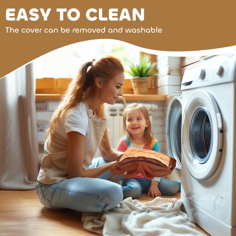 Washable plush cover being handled near washing machine