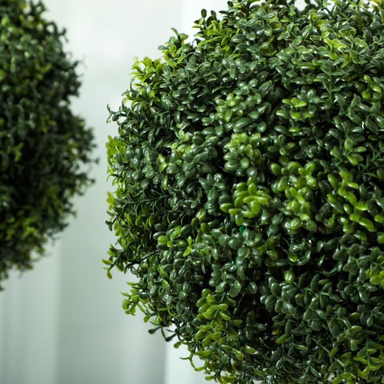 Green artificial boxwood topiary ball with dense PE leaf clusters