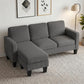 Dark gray sectional sofa with chaise, ribbed upholstery and wide cushioned armrests.