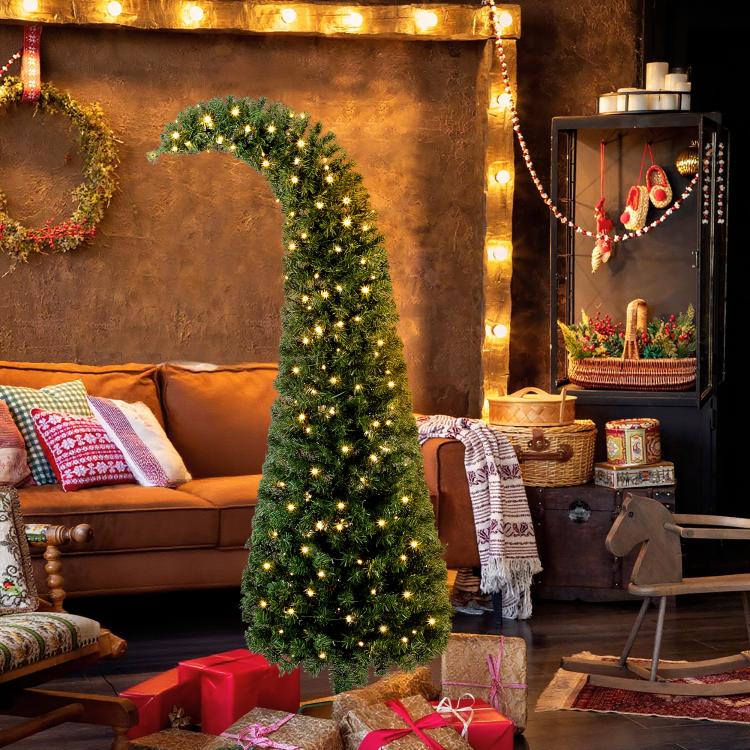 Slim green prelit Christmas tree with warm white LEDs and metal tripod stand, full view