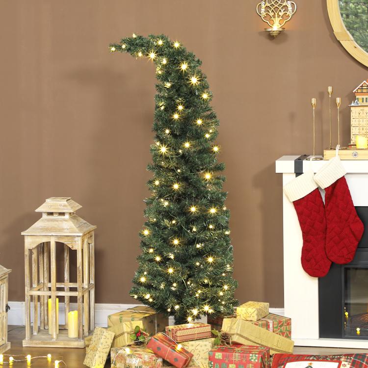 Slim prelit green Christmas tree with warm white lights and metal stand