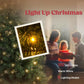 Warm white LED lights glowing on green Christmas tree branches