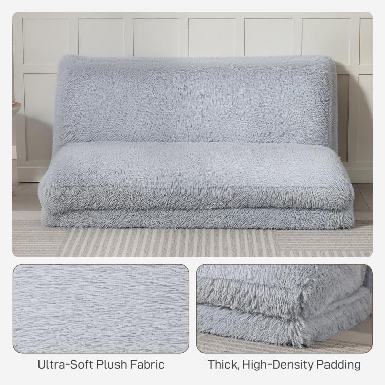 Light gray plush floor sofa bed with thick folded backrest and cushioned seat