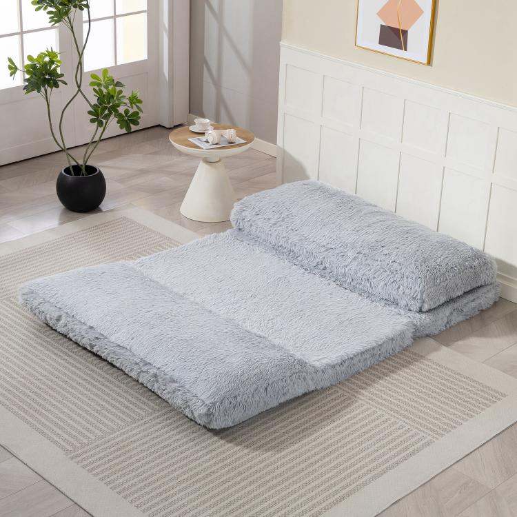 Light gray plush folding floor mattress with thick cushioned top panels