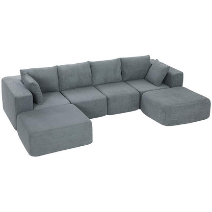 Dark gray modular U-shaped sectional sofa with two matching ottomans and chaise sections
