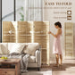 Folding wood room divider shown partially folded with three shelf sections