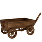 Wooden cart-style planter box with four wheels and open trough, long handle