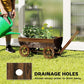 Wooden wagon planter box with four wheels and drainage holes in the bottom