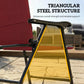 Triangular steel support brace on a red padded high-back patio chair