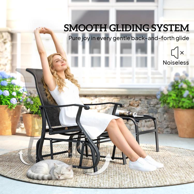 Black patio glider chair with smooth rocking base and ottoman footrest