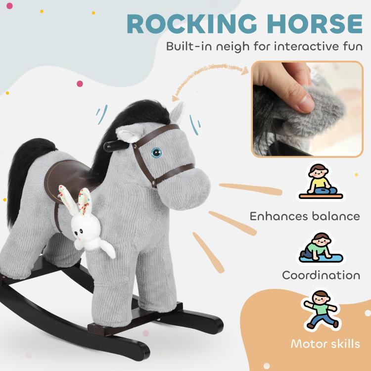 Gray plush rocking horse ride-on with black mane and brown saddle on black rockers