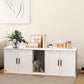 White cat litter box enclosure cabinet with front openings and cat sitting inside