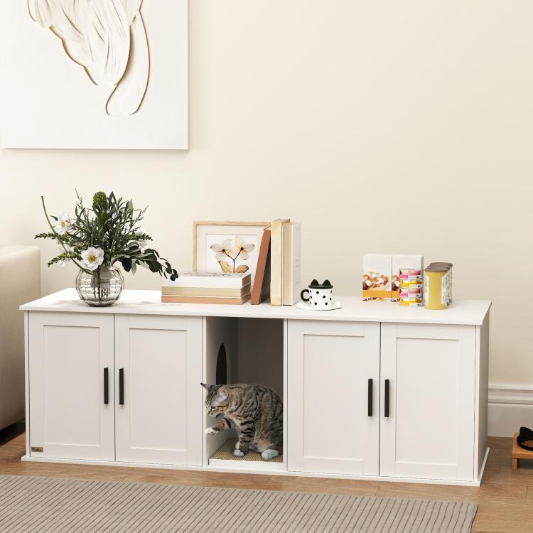 White cat litter box enclosure cabinet with front openings and cat sitting inside