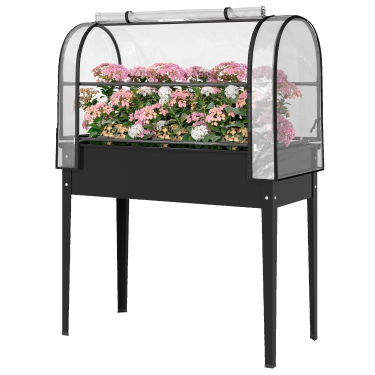 Black metal raised garden bed with clear arched greenhouse cover panels over plants