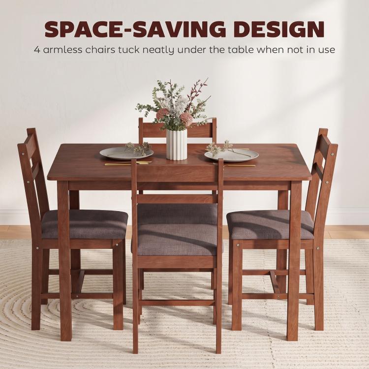 Light brown dining table set with four upholstered chairs, chairs tucked under