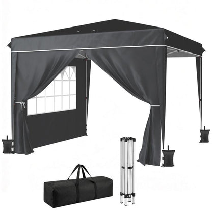 Black pop-up canopy tent with attached sidewalls, windows, and carry-bag setup pieces