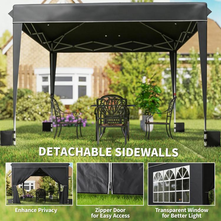 Black canopy tent with detachable sidewalls and window panels, shown with door zipper look