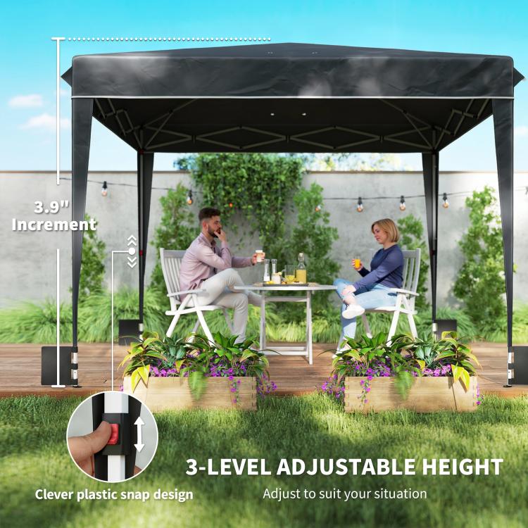 Black canopy tent over patio area, showing adjustable height and bottom attachment parts
