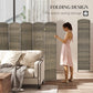 Folding privacy screen beside a person; woven dark rustic oak panels with arched top