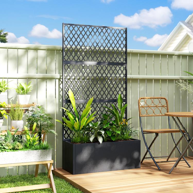 Black metal planter with diamond lattice trellis panel and potted plants