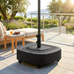 Outdoor umbrella stand base with center pole mount and rolling wheels, dark gray