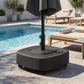 Outdoor umbrella base stand on wheels with central pole mount, patio setting