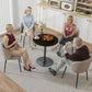 Round black wood-grain dining table with pedestal base, family seated around it