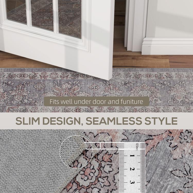 Floral grey and brown area rug edge detail with slim, flat seam design