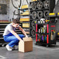 Black/red 3-tier rolling tool cart with side shelves and perforated panel, used for deliveries