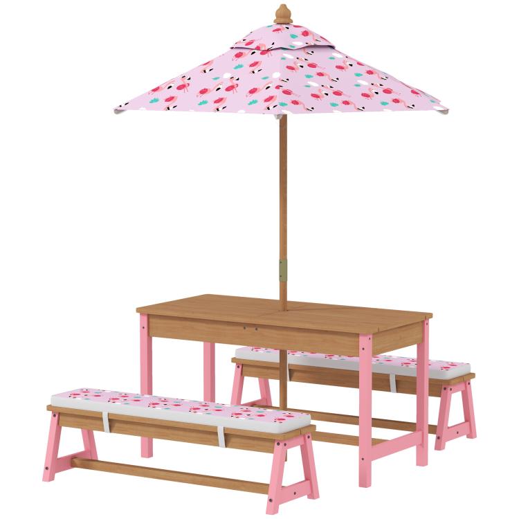 Pink flamingo-pattern umbrella over wooden kids picnic table with two benches