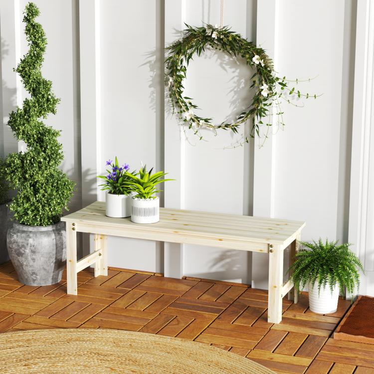 Light wood backless bench with slatted seat, two-seat length and open side supports