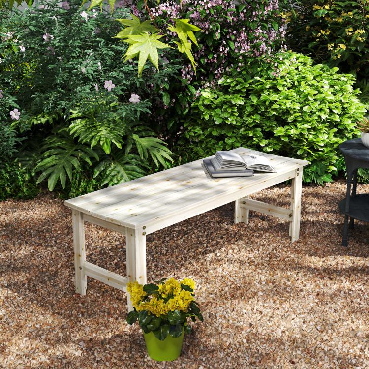Outdoor light wood bench with slatted top and two end frames, styled with planter
