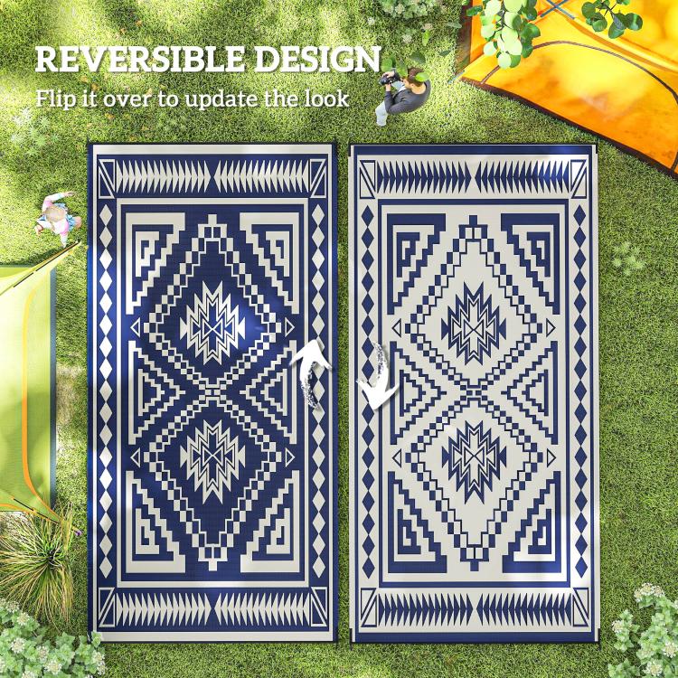 Reversible rug design showing two matching navy and white sides