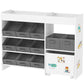 White toy organizer cabinet with gray bins across shelves and two lower storage compartments