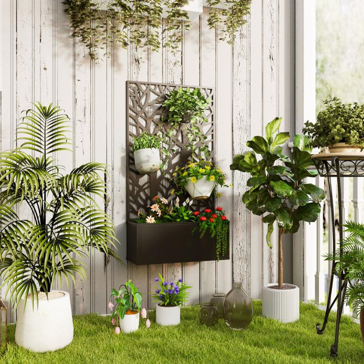 Wall-mounted black metal planter with trellis and planted flowers