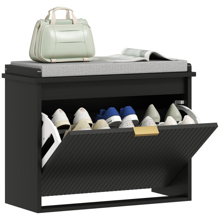 Black shoe storage bench with padded seat and flip drawer, open cabinet holding shoes