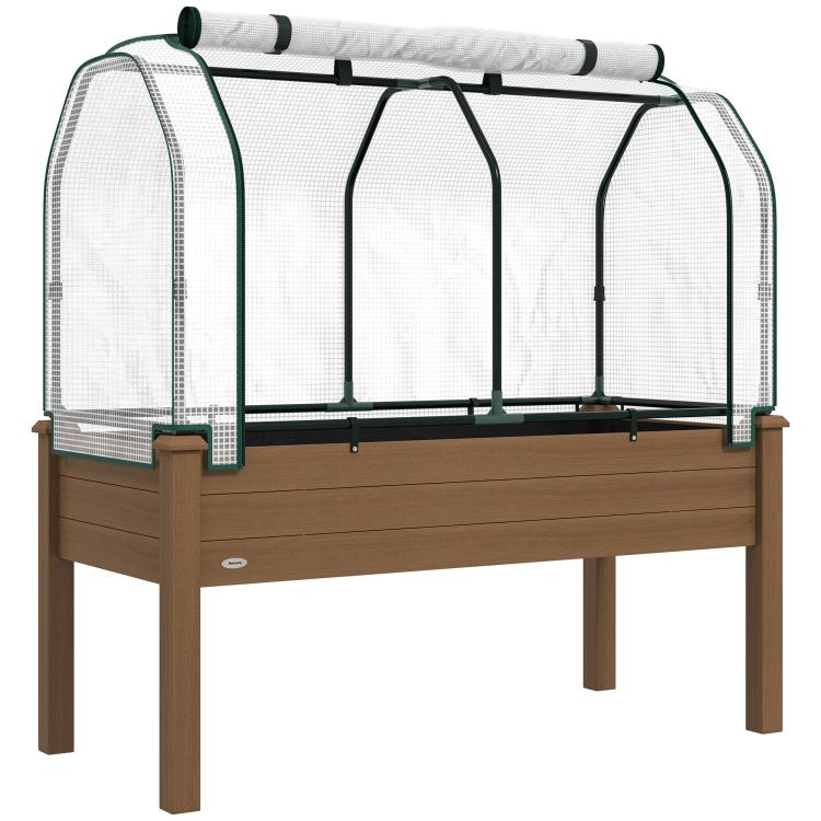 Brown raised garden bed with green frame and white mesh greenhouse cover