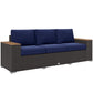 3-seat outdoor patio sofa, dark gray wicker with navy back and seat cushions