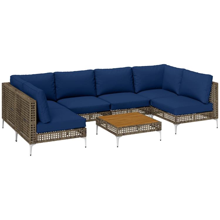 Wicker modular outdoor sectional with blue cushions, two ottomans, and center coffee table
