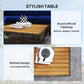 Acacia wood tabletop coffee table on woven wicker frame with slatted design